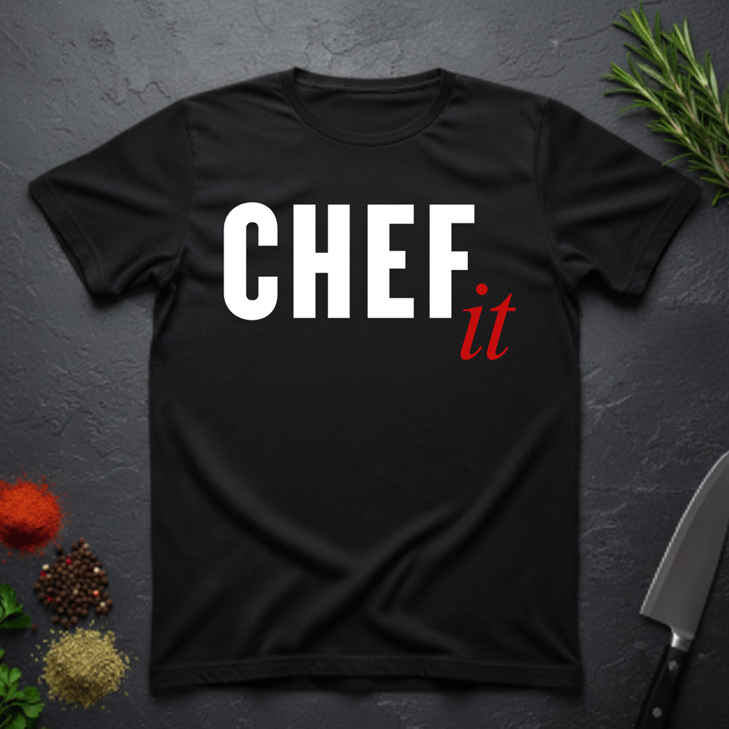 Black t-shirt with 'CHEF it' text on a dark surface with kitchen items.