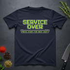 Navy Blue t-shirt with green text "Service Over-Press Start for Next Shift" on a dark surface.