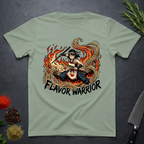 Sage Green t-shirt with 'Flavor Warrior' graphic anime design on a dark surface.