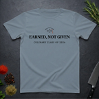 Stone Blue t-shirt with 'Earned, Not Given Culinary Class of 2026' text on a dark surface.