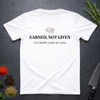 White t-shirt with 'Earned, Not Given Culinary Class of 2026' text on a dark surface.