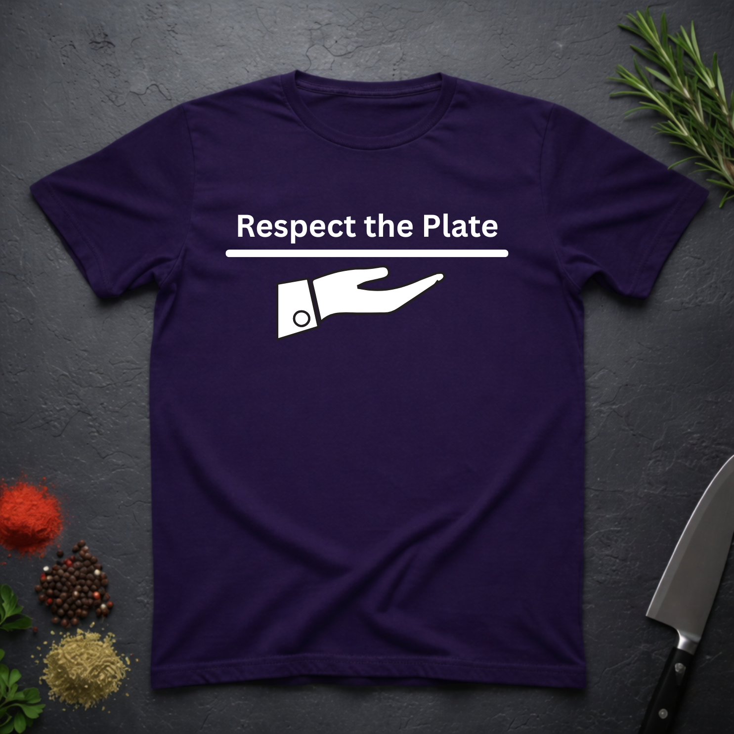 Amethyst Purple t-shirt with 'Respect the Plate' graphic on a dark surface with kitchen items.