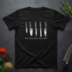 Black t-shirt with knife graphic and text 'Peel, Chop, Slice, Carve, Dice' on a dark surface with kitchen items.