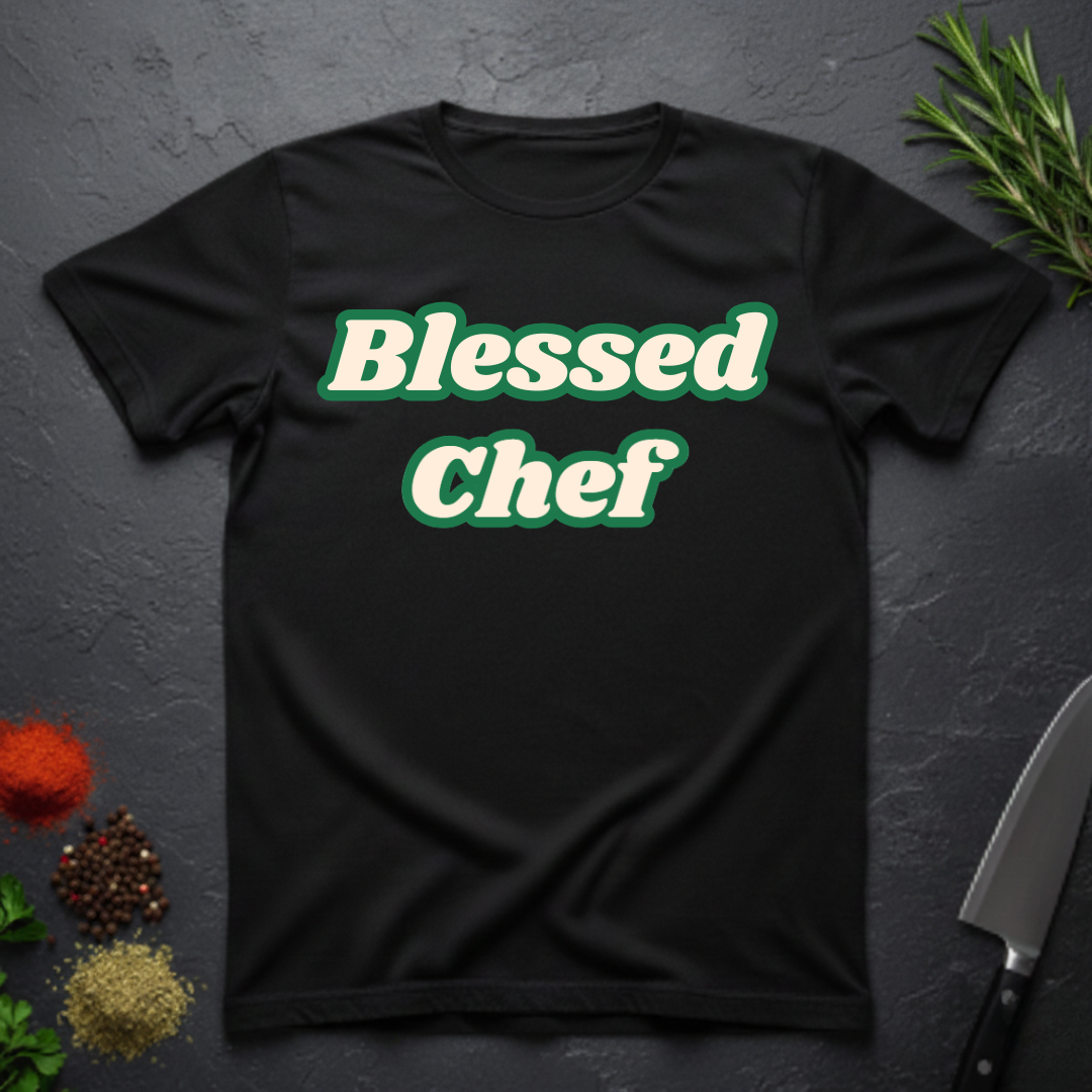 Black t-shirt with 'Blessed Chef' text on a dark surface with kitchen items.