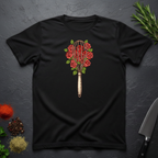 Black t-shirt with a design of a whisk and roses as a bouquet on a dark surface.