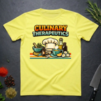 Cornsilk Yellow t-shirt with 'Culinary Therapeutics' graphic on a dark surface with kitchen items.