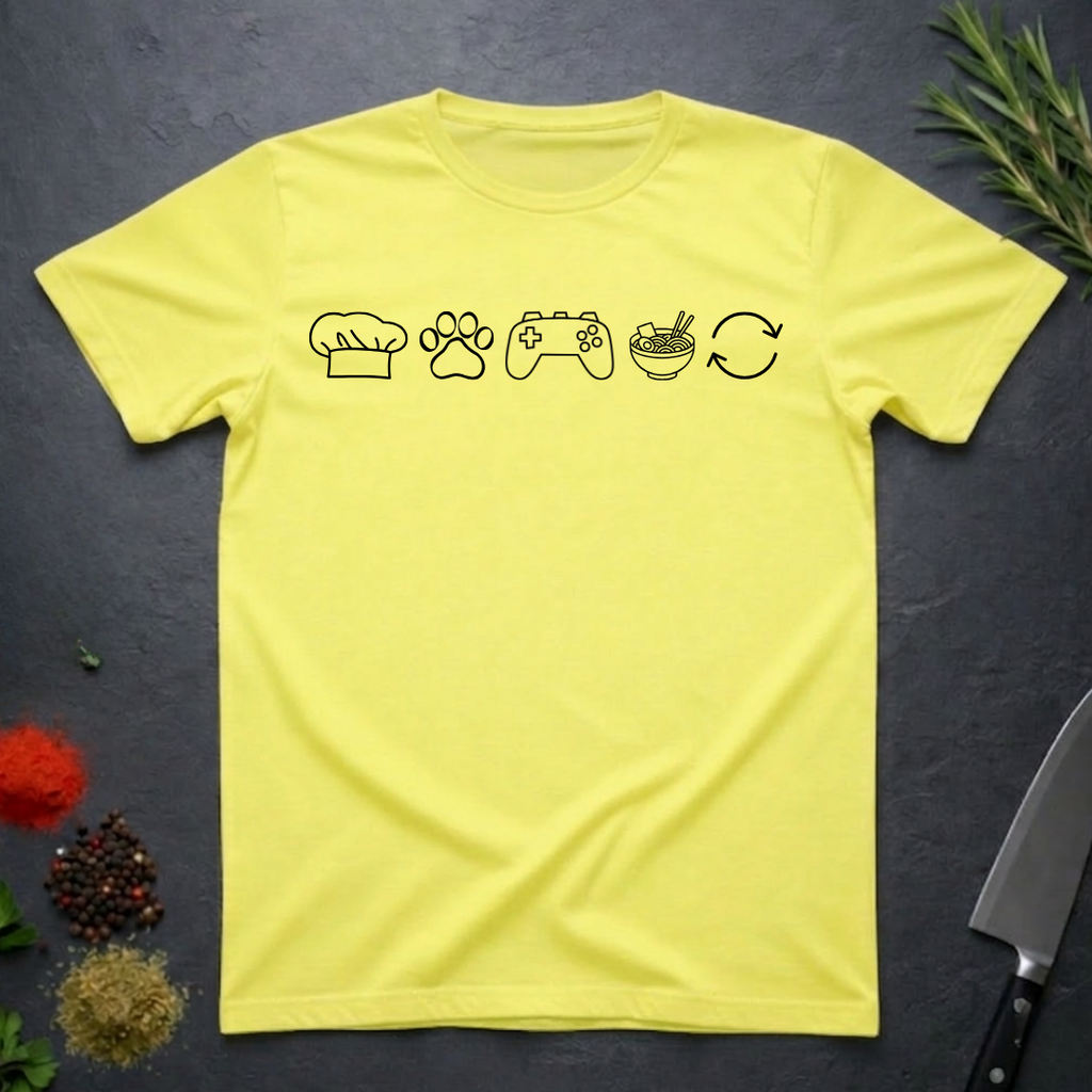 Cornsilk yellow t-shirt with black icons of chef hat, paw print, game remote, ramen bowl and repeat symbol on a dark surface.