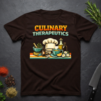 Chocolate Brown t-shirt with 'Culinary Therapeutics' graphic on a dark surface with kitchen items.