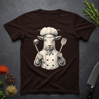 Chocolate Brown t-shirt with a graphic of a chef goat holding cooking utensils on a dark surface.