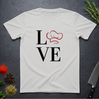 Ice Grey t-shirt with 'LOVE' design featuring a chef's hat as the letter O on a dark surface.