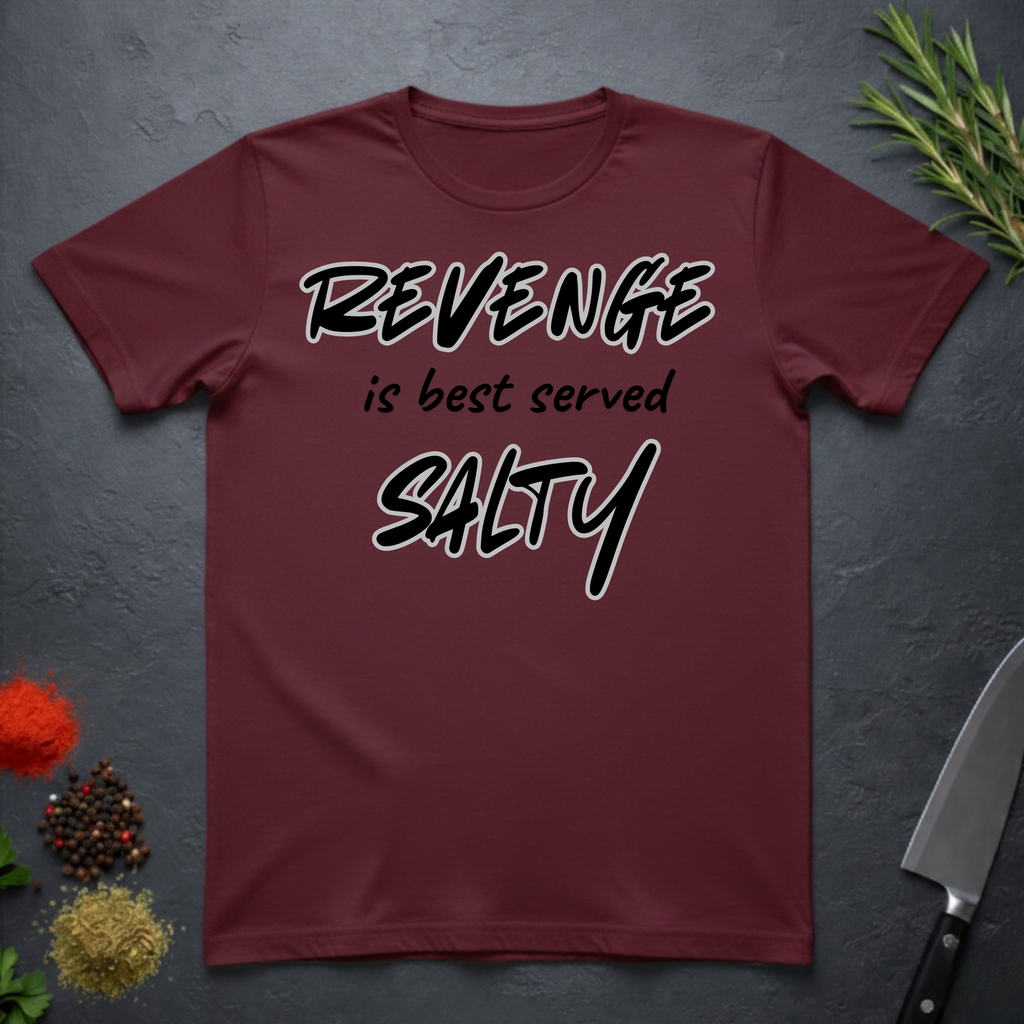 Maroon t-shirt with 'REVENGE is best served SALTY' text on a dark surface.