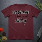 Maroon t-shirt with 'REVENGE is best served SALTY' text on a dark surface.