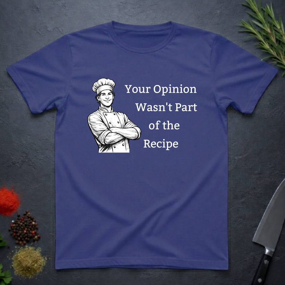 Metro blue t-shirt with a male chef graphic and text "Your Opinion Wasn't Part of the Recipe" on a dark surface with kitchen items.