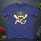 Metro blue t-shirt with skull and crossed knives with vegetables design with text "Death To Vegetable" on a dark surface.