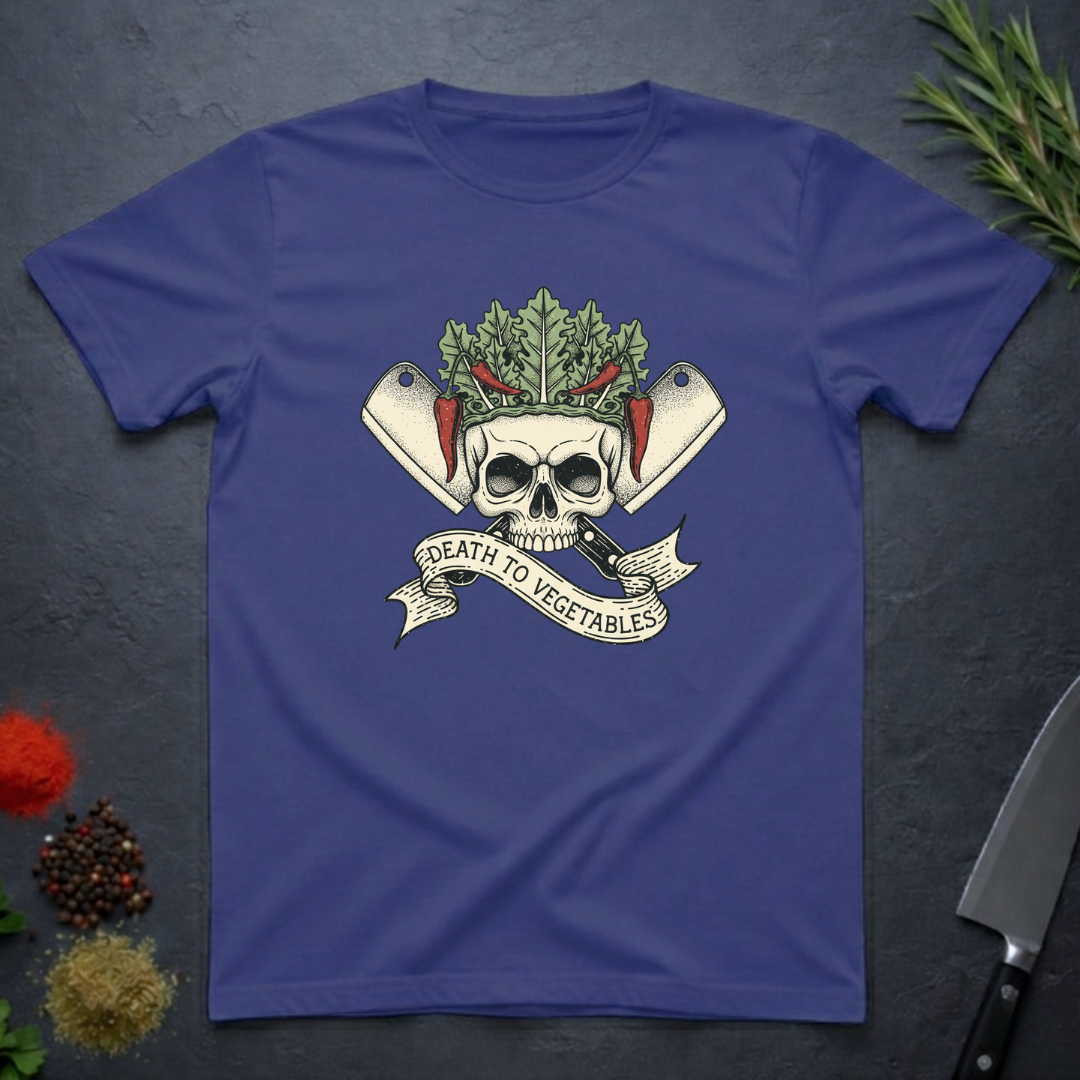 Metro blue t-shirt with skull and crossed knives with vegetables design with text "Death To Vegetable" on a dark surface.
