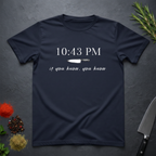 Navy blue t-shirt with knife graphic and text "10:43 PM - if you know, you know" on a dark surface.