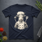 Navy blue t-shirt with a graphic of a chef goat holding cooking utensils on a dark surface.