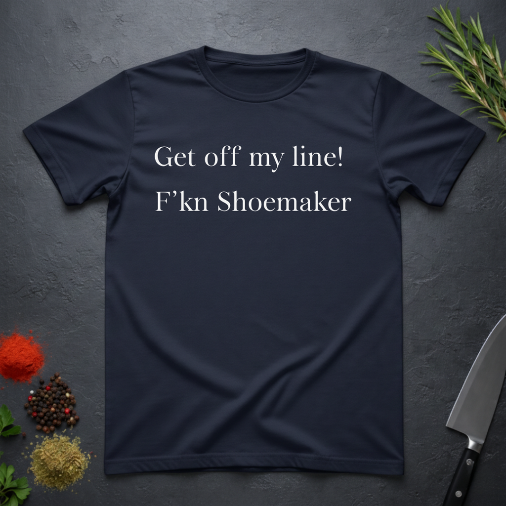 Navy blue t-shirt with text "Get off my line! F'kn Shoemaker" on a dark surface.