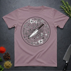 Paragon colored t-shirt with a circular floral and knife design on a dark surface.