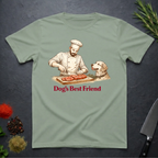 Sage Green t-shirt with a chef and dog graphic and 'Dog's Best Friend' text on a dark surface.