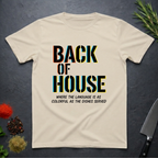 Sand colored t-shirt with 'Back of House' text on a dark surface with kitchen items.