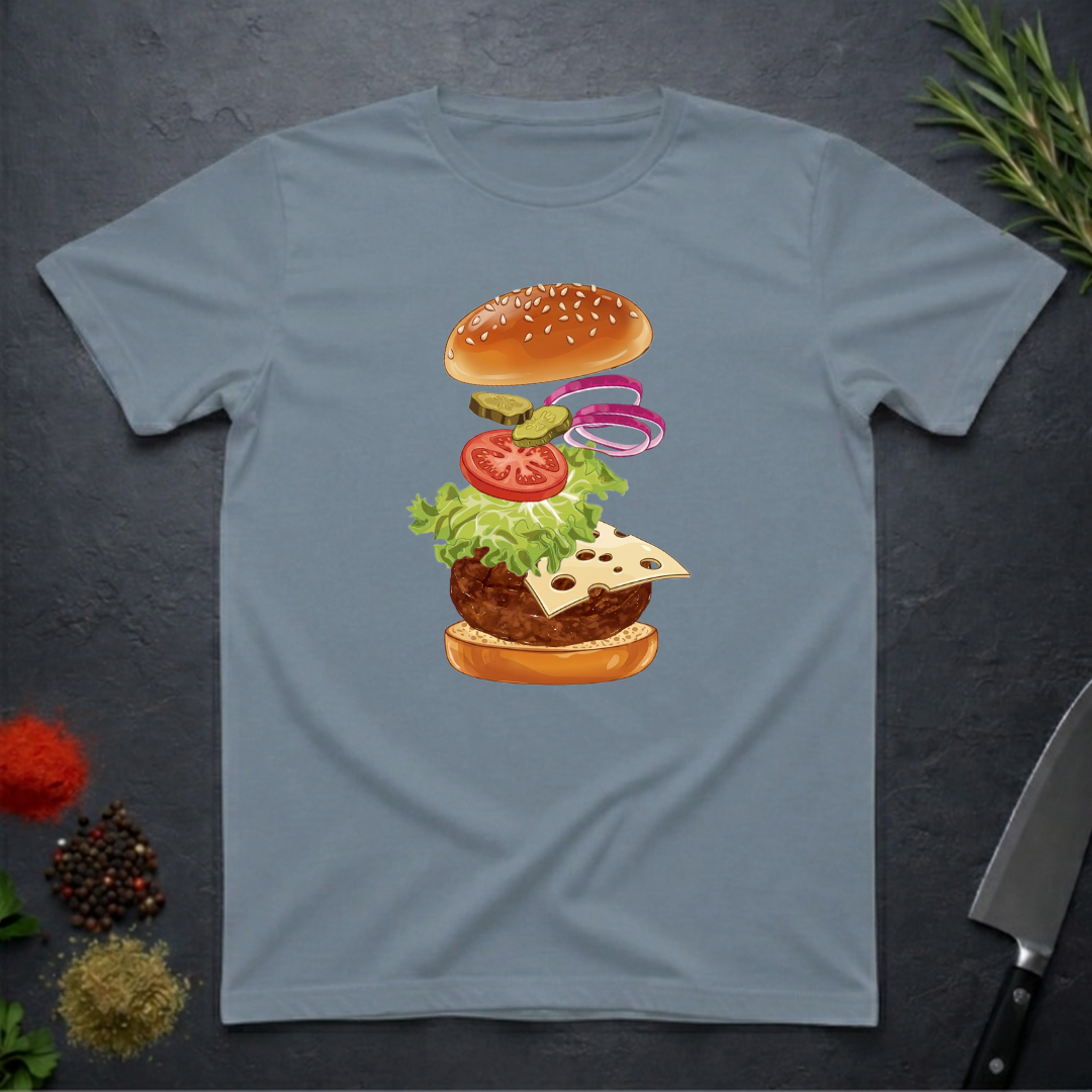 Stone Blue t-shirt with a colorful stacked burger ingredients graphic on a dark surface.