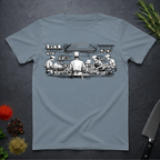 Stone blue t-shirt with black and white graphic of chefs in a kitchen scene on a dark surface.