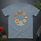 Stone blue t-shirt with circular 'Global Cuisine' graphic design on a dark surface.