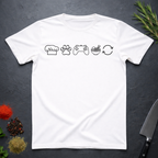 White t-shirt with black icons of chef hat, paw print, game remote, ramen bowl and repeat symbol on a dark surface.